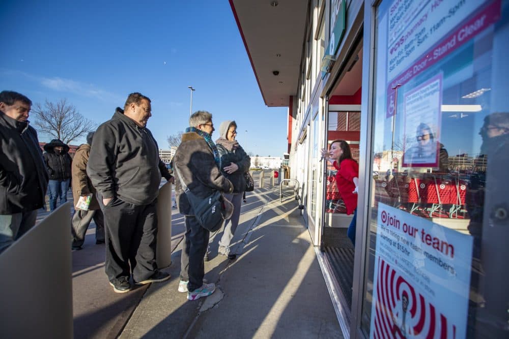 Target in Watertown opens its doors at 8 a.m. for seniors and people with compromised immune systems who are potentially at-risk to contract the Coronavirus to shop exclusively for the first hour of operation, March 18, 2020. (Jesse Costa/WBUR)