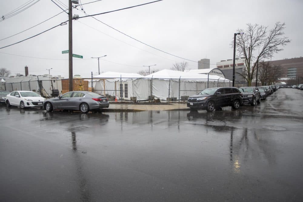 The tents designated for people who are homeless who may be affected by coronavirus behind the shelter on Southampton Street in Boston. (Jesse Costa/WBUR)