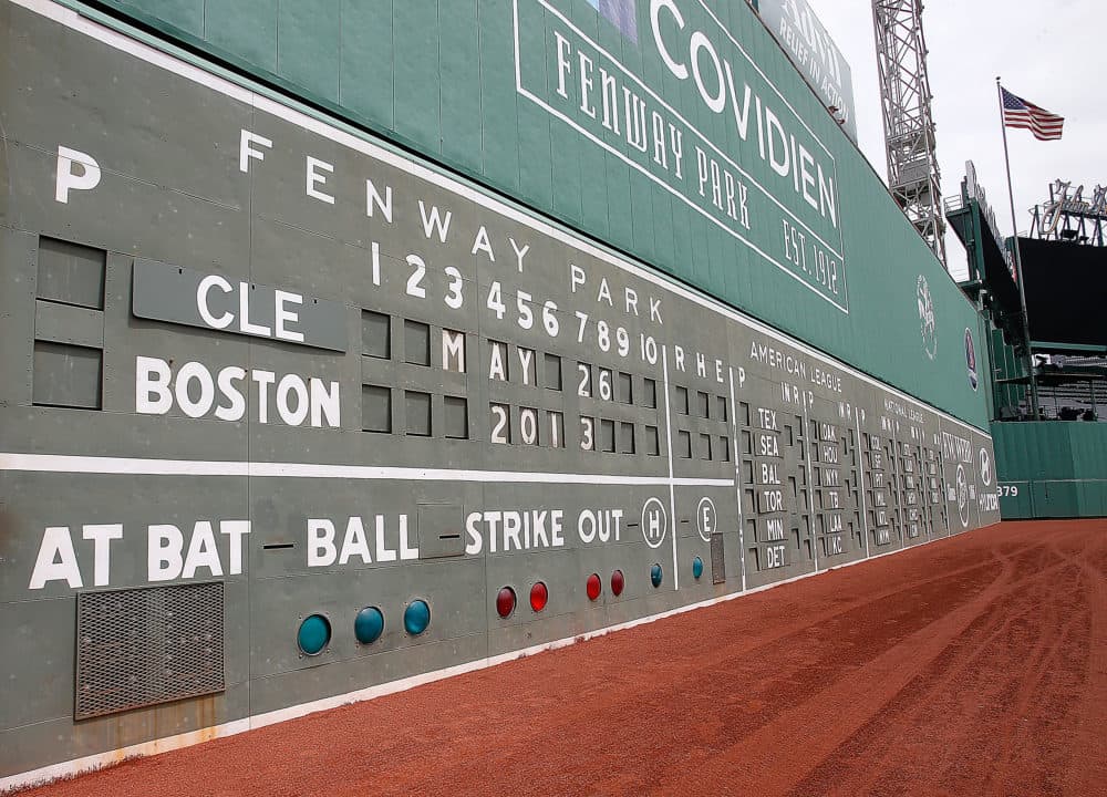 David grew up as a diehard Boston Red Sox fan, enough to name his backyard fences Green Monster after the famous left field wall at Boston's Fenway Park. (Jim Rogash/Getty Images)