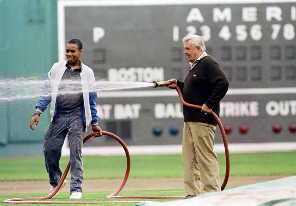 After 31 years as the Boston Red Sox' groundskeeper, Joe Mooney (right) called David to offer him his job. (Mark Lennihan/AP)