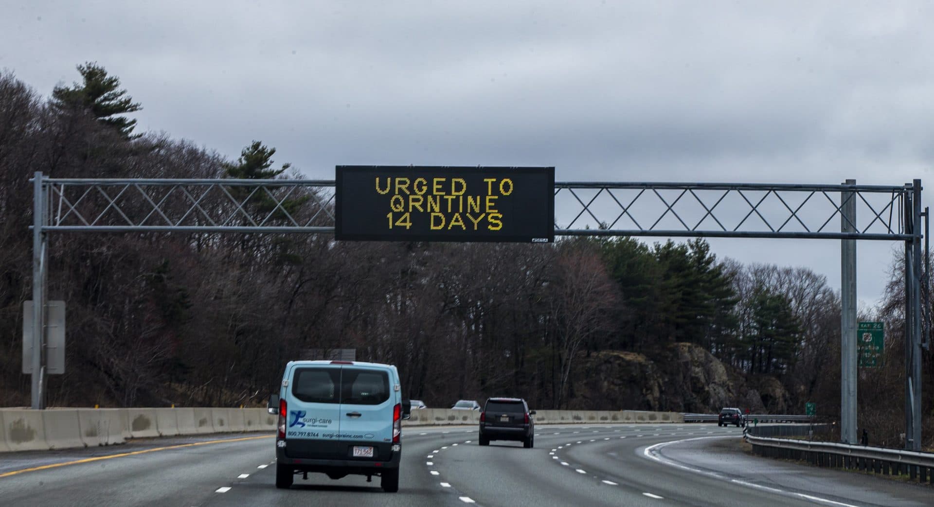 March 30: A sign on Interstate 95 in Waltham urging drivers from outside of Massachusetts to quarantine for two weeks when arriving for their visit. (Jesse Costa/WBUR)