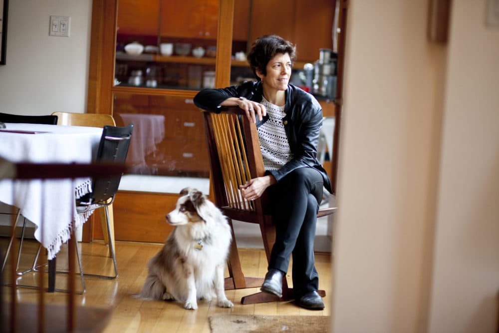 The author, a Harvard Medical School associate professor of psychiatry, pictured at her Cambridge home with dog, in 2012. She was diagnosed with cancer in August 2015. (Rose Lincoln/Harvard Staff Photographer)