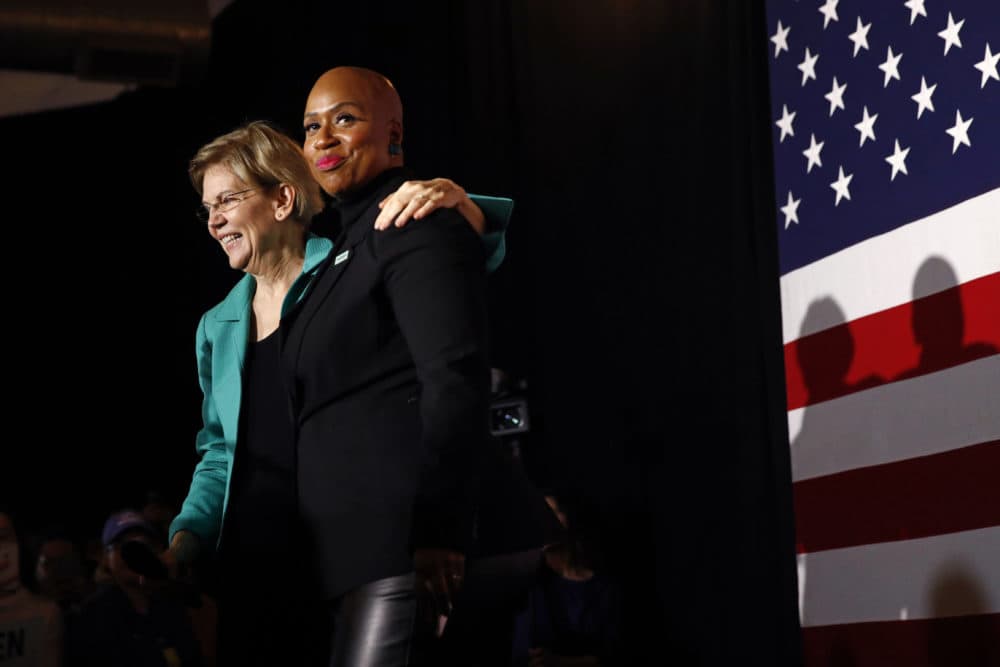 Sen. Elizabeth Warren, D-Mass., left, stands onstage with Rep. Ayanna Pressley, D-Mass., before speaking at a campaign event in South Carolina. (Patrick Semansky/AP)