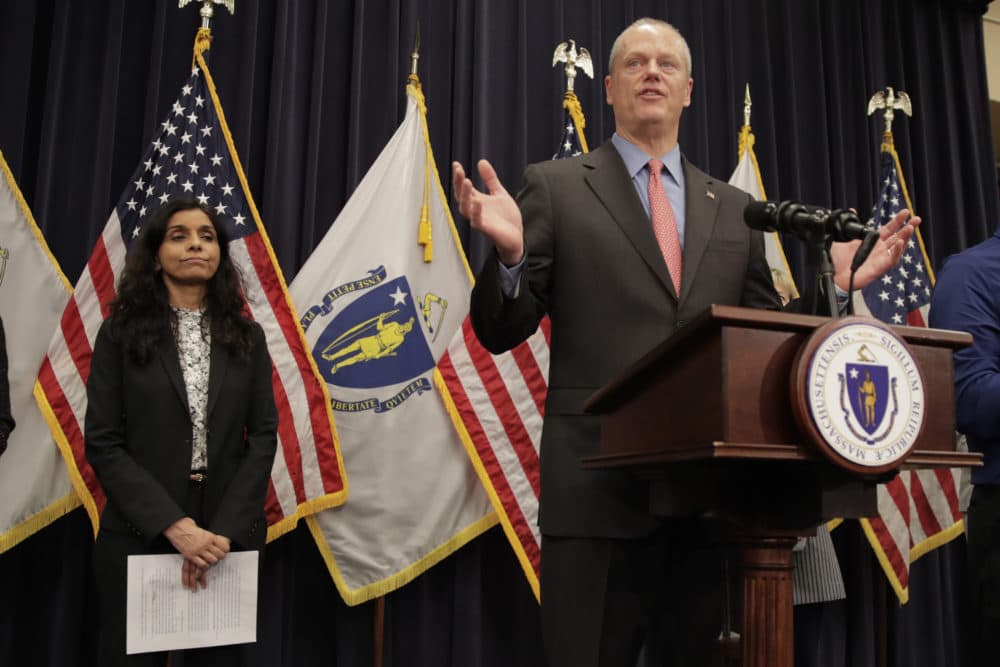 Massachusetts Gov. Charlie Baker announces that a state of emergency would go into effect during an update with Commissioner of the Massachusetts Department of Public Health, Dr. Monica Bharel, left, on coronavirus preparedness and planning at the Statehouse in Boston, Tuesday, March 10, 2020. (Charles Krupa/AP)