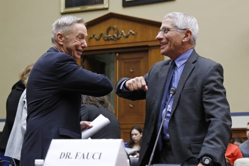 Rep. Stephen Lynch, D-Mass., left, bumps elbows with Dr. Anthony Fauci, director of the National Institute of Allergy and Infectious Diseases, prior to testimony from Fauci before a House Oversight Committee hearing on preparedness for and response to the coronavirus outbreak on Capitol Hill in Washington, Wednesday, March 11, 2020. (Patrick Semansky/AP)