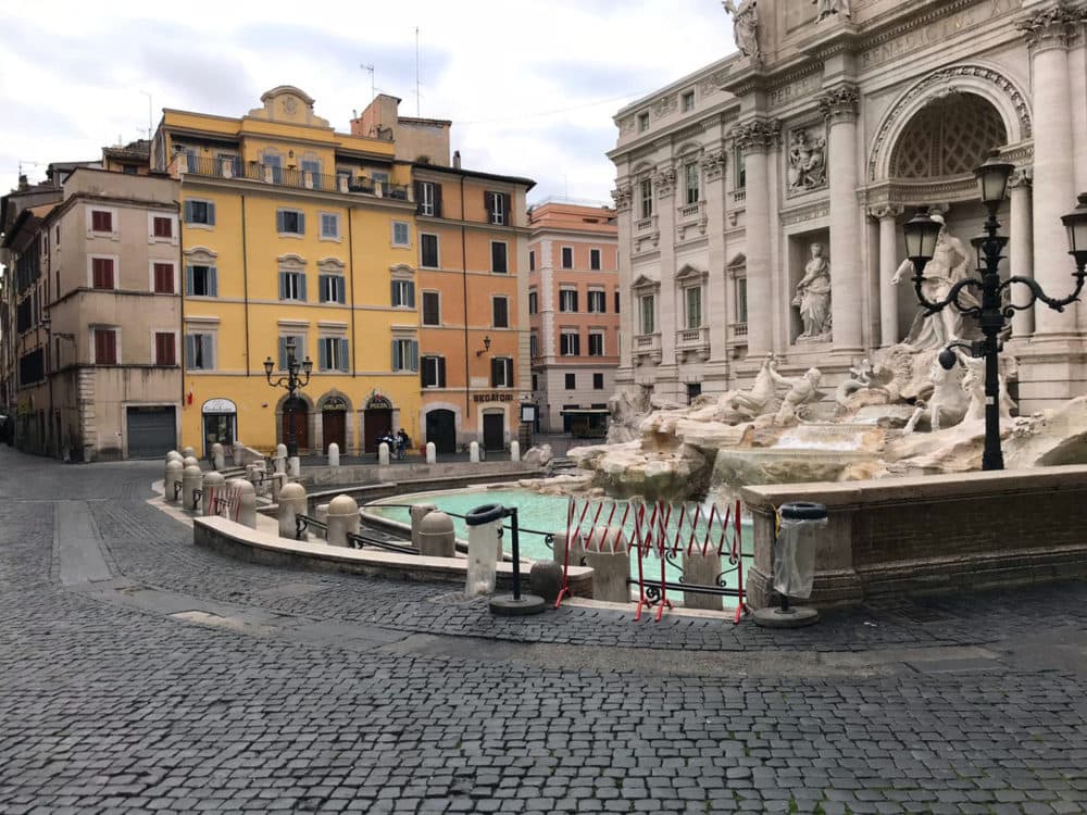 A view of the empty square facing the Trevi fountain, in Rome, Saturday, March 14, 2020. A sweeping lockdown is in place in Italy to try to slow down the spread of coronavirus epidemic. (Karl Ritter/AP)