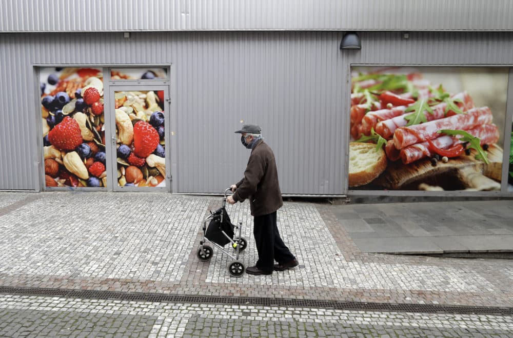 As the coronavirus outbreak forces people into self-quarantine, long hours without leaving the house can turn friendly neighbors into far-off strangers. (Petr David Josek/AP)