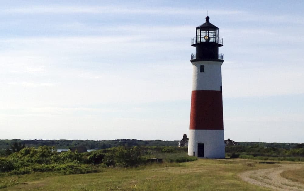 In this Thursday June 18, 2015 photo, Nantucket's Sankaty Head Light is bathed in late afternoon sunshine on Nantucket island. (William J. Kole/AP)