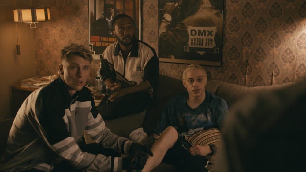 Pete Davidson (right), Omar Shariff Brunson Jr. (center) and Machine Gun Kelly in &quot;Big Time Adolescence.&quot; (Courtesy NEON)