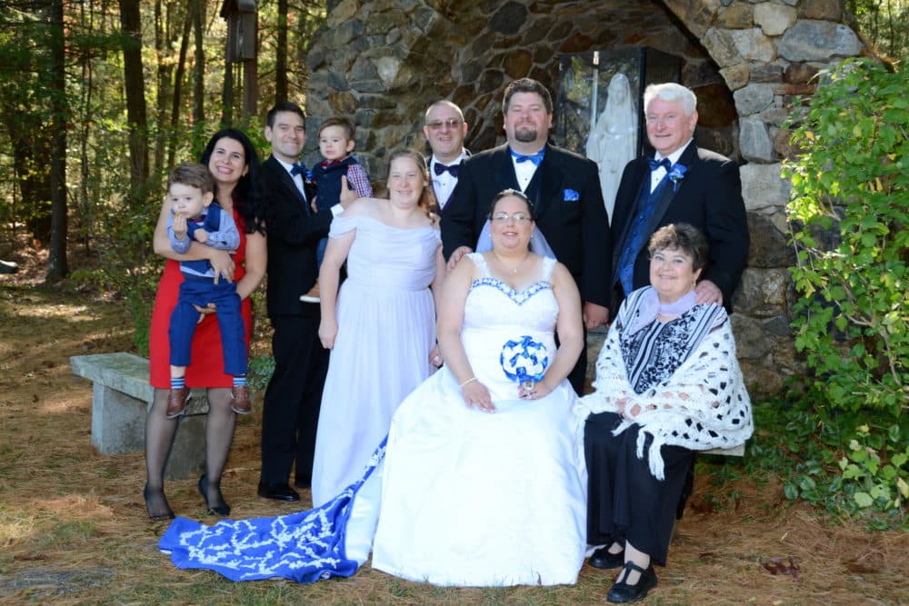 Michael and Tara O'Brien with family on their wedding day. (Courtesy)