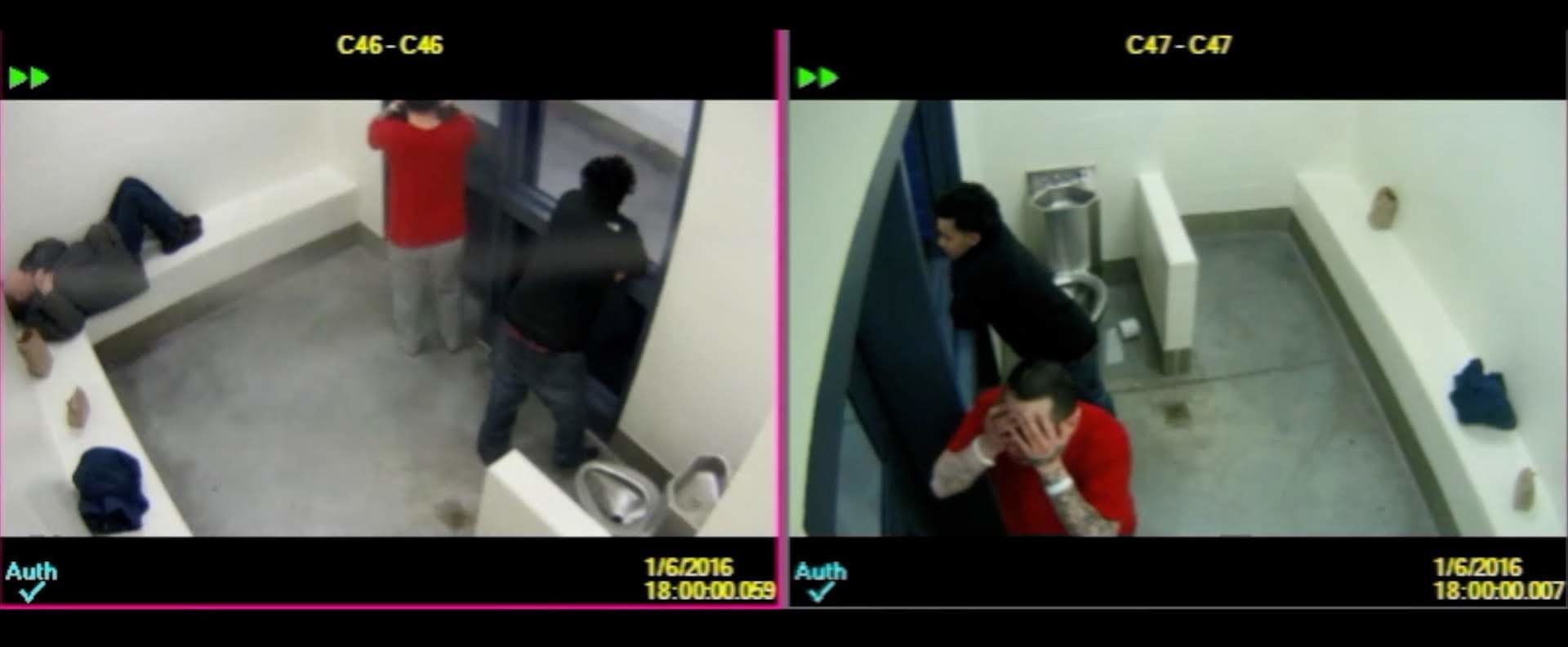 Screenshots of video show Sam Dunn, in the red shirt, inside a group cell at the Essex County jail prior to being transported to a treatment center in Bridgewater. (Essex County sheriff’s office)