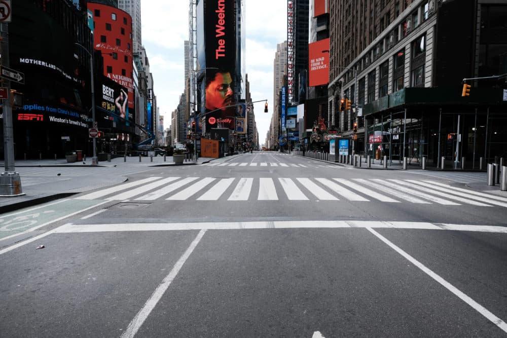 Times Square stands mostly empty as as much of the city is void of cars and pedestrians over fears of spreading the coronavirus on March 22, 2020 in New York City. (Spencer Platt/Getty Images)