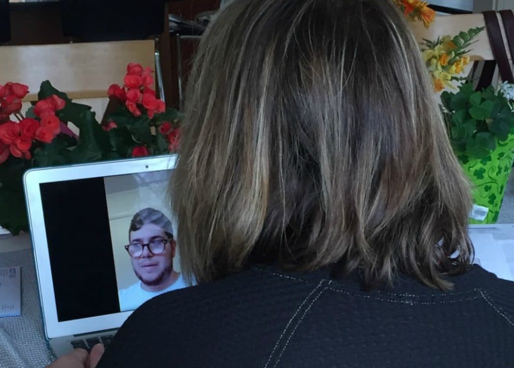 The author FaceTiming her son, Adam, who has been self-quarantined in his bedroom since arriving home to Massachusetts from Spain in March 2020. (Courtesy)