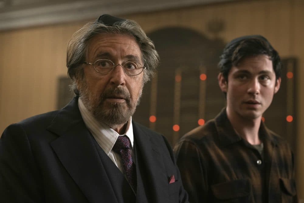 This image released by Amazon Studios shows Al Pacino, left, and Logan Lerman in a scene from &quot;Hunters.&quot; (Christopher Saunders/Amazon Studios)