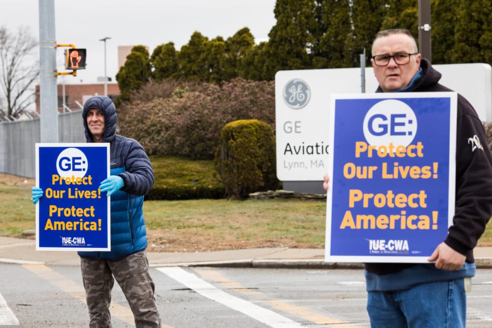 Workers protest several feet apart outside the GE Aviation facility in Lynn, Mass. (Courtesy: Adrianne Mathiowetz, IUE-CWA)