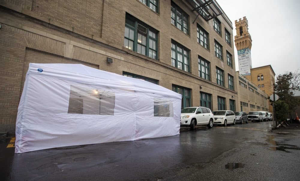 Pine Street Inn put up a coronavirus testing tent for people who are homeless on Albany St. in Boston. (Jesse Costa/WBUR)