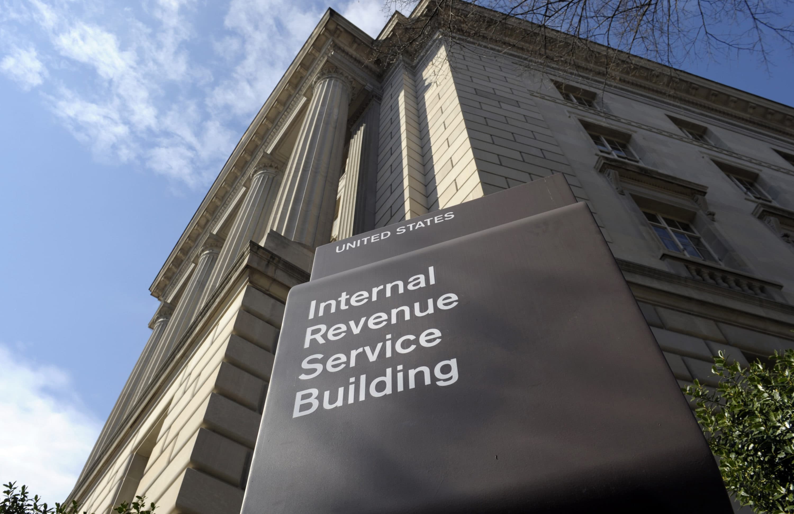It's estimated that hundreds of Massachusetts families living in mixed immigration status households are being penalized for following tax rules — rules that make them ineligible for federal stimulus funds. (Susan Walsh/AP)