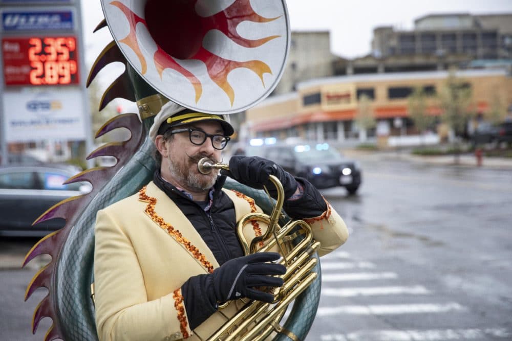 Zachariah Hickman playing his sousaphone on Galen Street in Watertown, Massachusetts. (Robin Lubbock/WBUR)