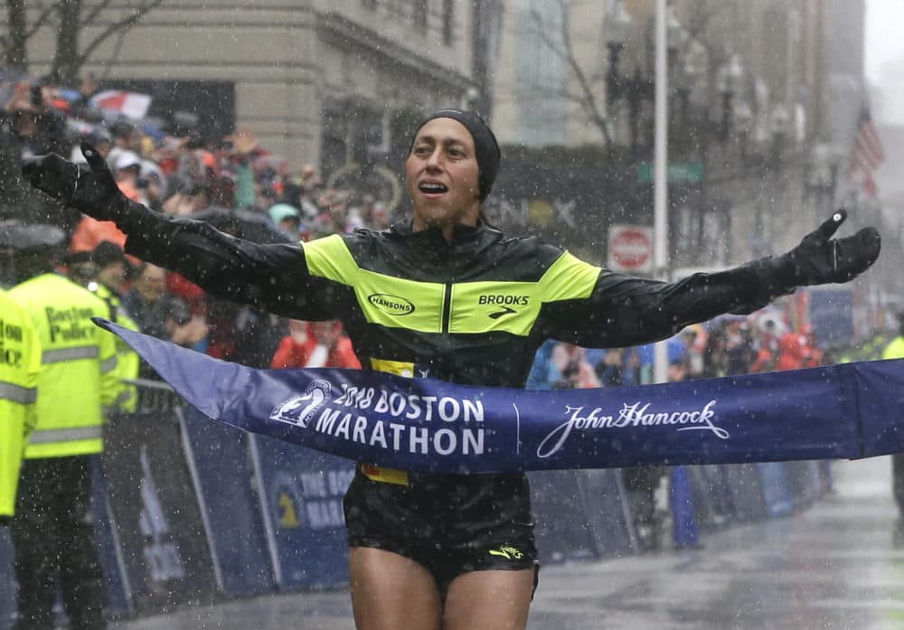 Desiree Linden crosses the finish line to win the women's division of the 122nd Boston Marathon on April 16, 2018, in Boston. Linden was the first American woman to win the race since 1985. (Elise Amendola/AP)