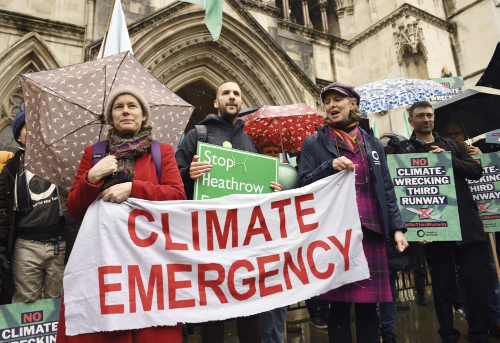 Some experts believe pandemics like the coronavirus are made worse as climate change effects increase. Climate change protesters demonstrate outside the Royal Courts of Justice in London back in February. (Stefan Rousseau/PA via AP)