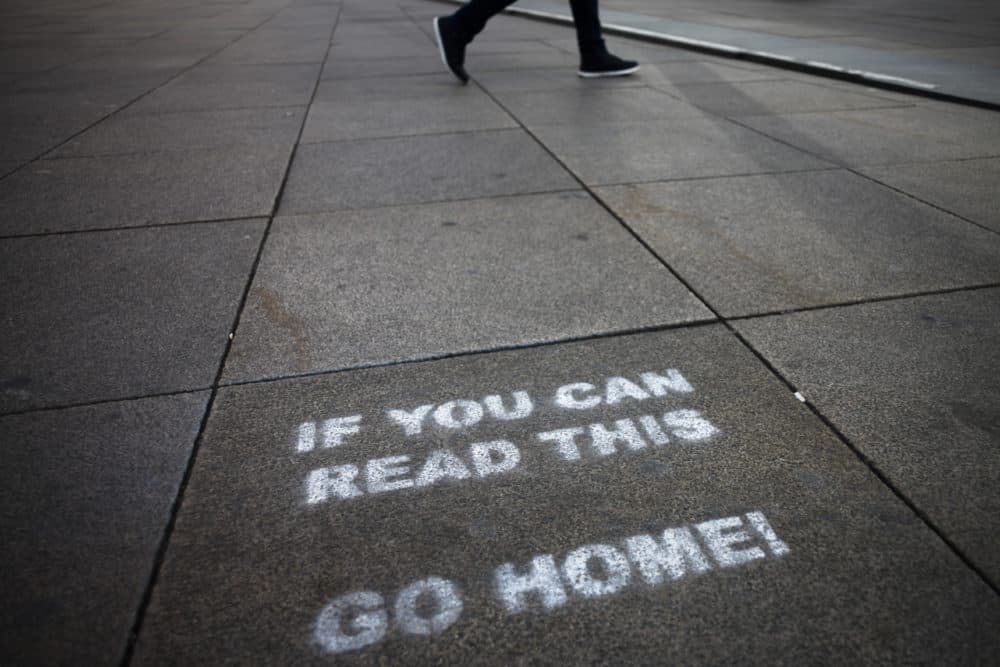 In this March 30, 2020, file photo, a message demanding the people to go home is sprayed on the ground of Alexanderplatz square in Berlin, Germany. (Markus Schreiber/AP)
