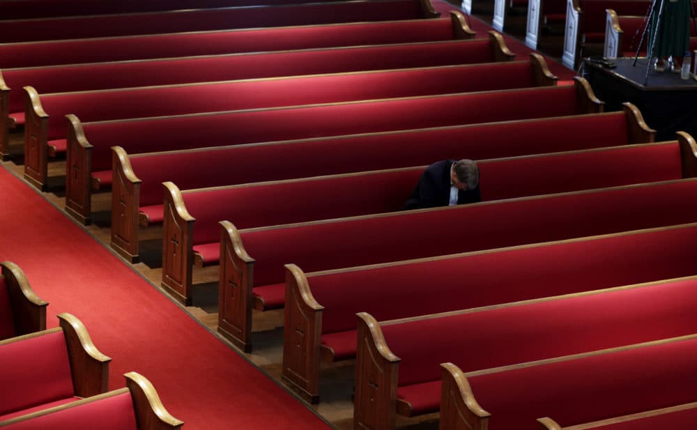A man prays while attending an Easter service at Trinity Baptist Church in San Antonio, Sunday, April 12, 2020. Many churches are adapting their services as Christians around the world are celebrating Easter at a distance due to the COVID-19 pandemic. (Eric Gay/AP)