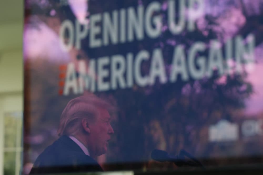 As he is reflected in a monitor, President Donald Trump speaks about the coronavirus in the Rose Garden of the White House, Monday, April 27, 2020, in Washington. (Alex Brandon/AP)