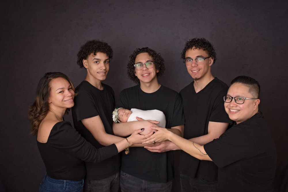 Poet Star Chung, far right, with her family and newborn daughter. (Courtesy Miss Z Photography)