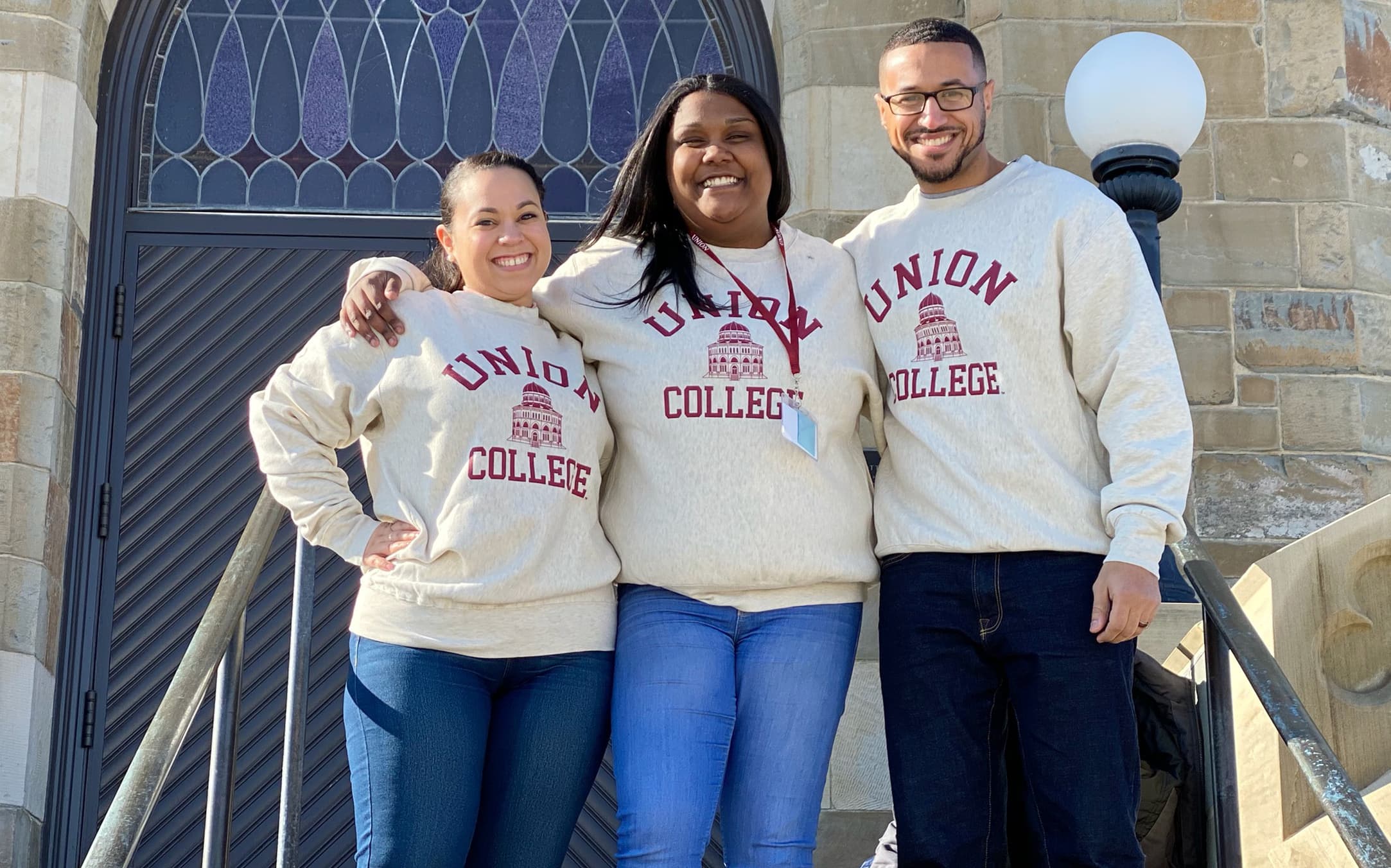 Graduating senior Ashley German (center), with her former teacher Meliza Prieto and Prieto’s husband Candinho Gomes at the Union College admitted-students day. (Courtesy Ashley German)