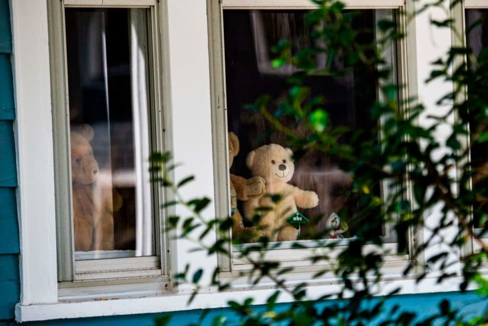 Stuffed toys are being placed in windows or under porches to give children a fun and safe activity while walking around their neighborhood with parents. (Eric Baradat/AFP/Getty Images)