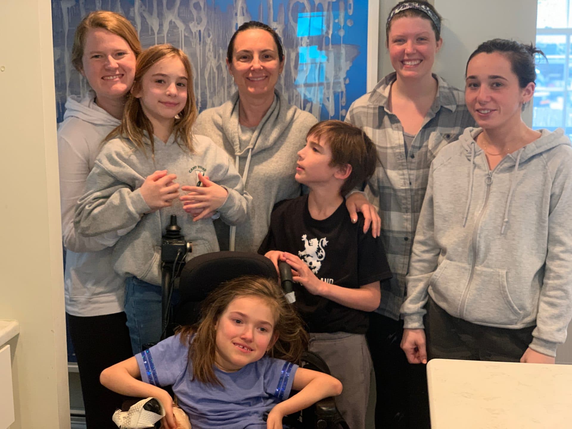 Dawn Oates (center) with her children, Olivia, Jack and Harper; Nurses Kristin Hanifin and Darby Sheehan (right) and aide Kendra Sloan (left) (Photo courtesy Dawn Oates)