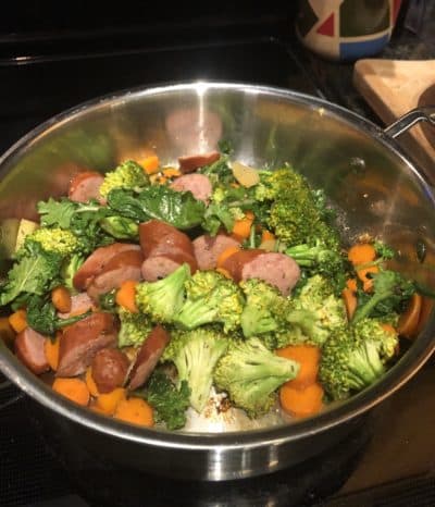 Cristela's roasted vegetables and kielbasa in process. (Cristela Guerra/WBUR)