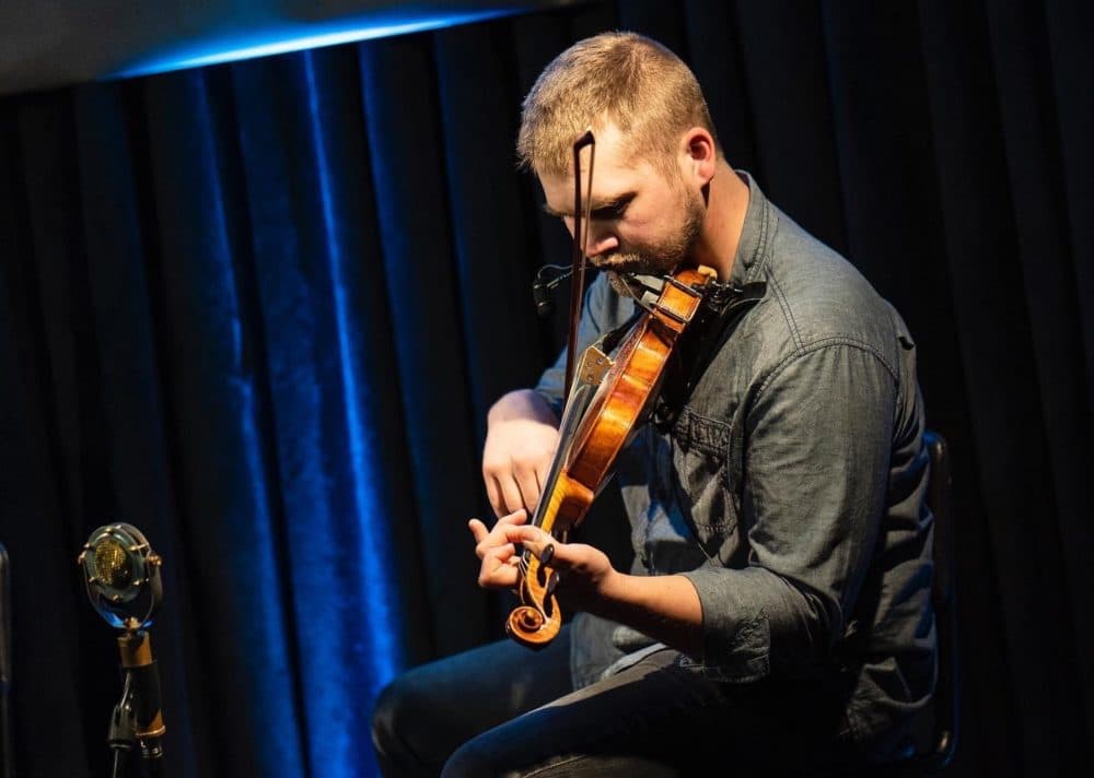 Jacob Brillhart plays one of his violins. (Courtesy Dylan Ladds)