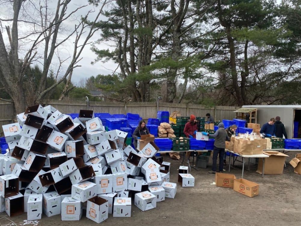 Workers pack CSA boxes at Siena Farms. (Courtesy Siena Farms)