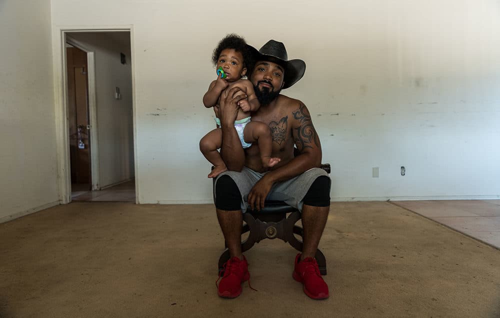 Randy Hook and his son. (Photo by Walter Thompson-Hernández)