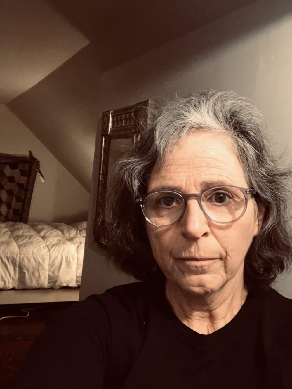 Dr. Elizabeth Mitchell, an emergency room physician, sleeps and spends time in an attic bedroom to minimize contact with her family in Boston. (Courtesy Elizabeth Mitchell)