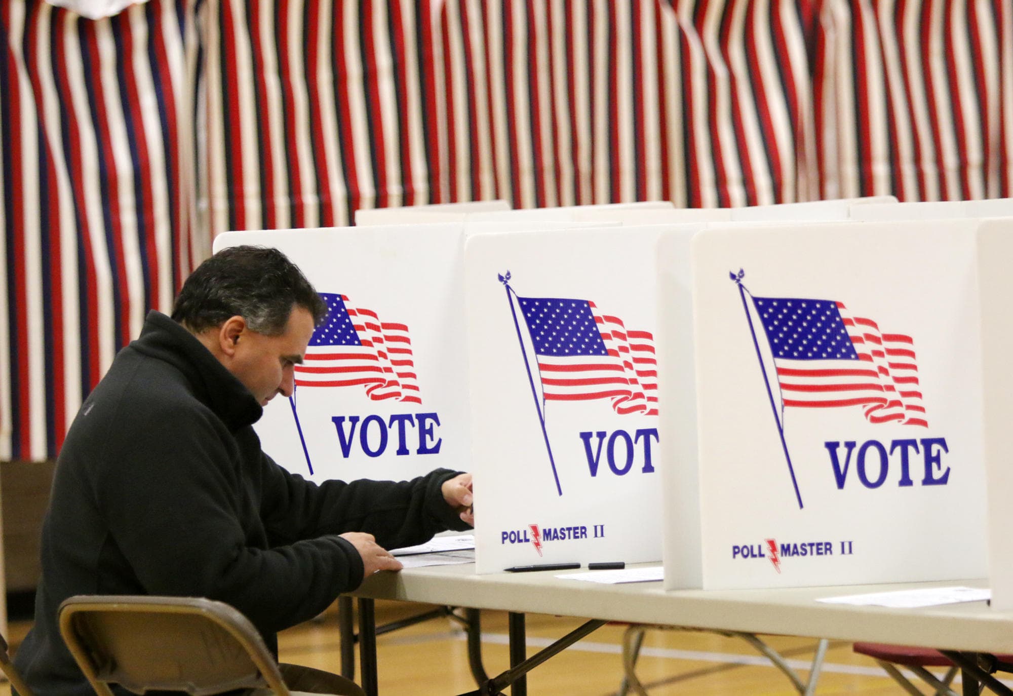 Election Day at Hollis-Brookline High School in Hollis. Bill Kotelly was voting. (Allegra Boverman/NHPR)