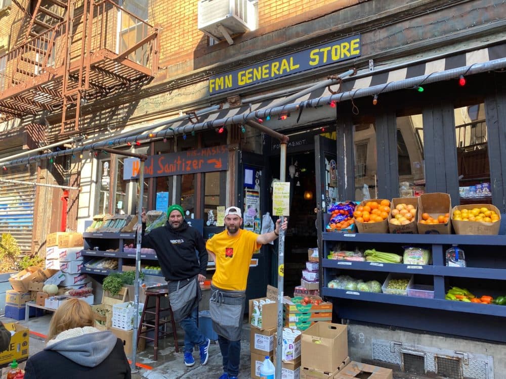 Pavlos Sierros and Derek Tighe outside Pavlos' bar-turned-makeshift grocery store in New York City. (Photo Credit: Mahir)