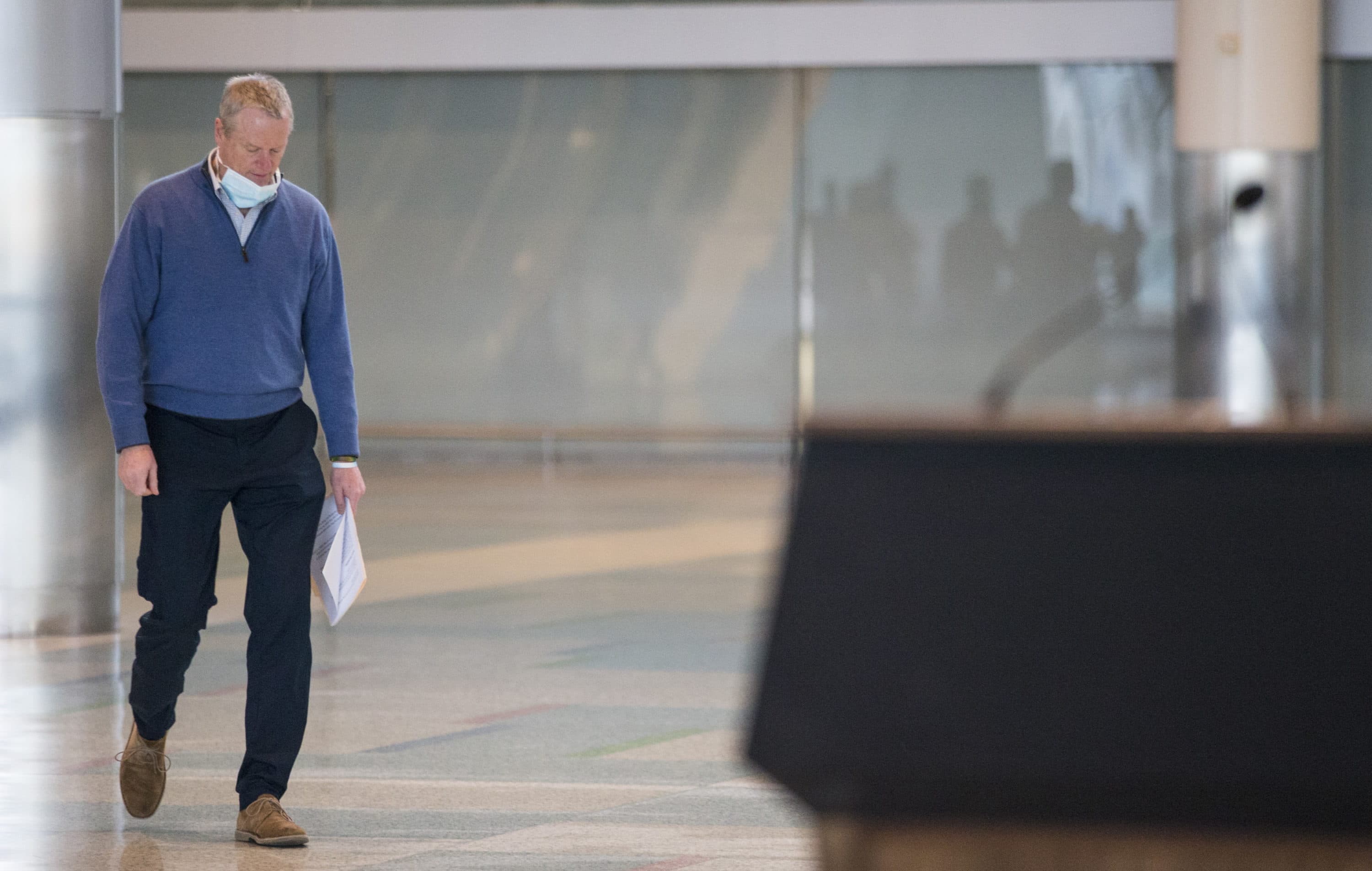 Gov. Charlie Baker walked to the microphone Saturday, April 18 to discuss the COVID-19 field hospital set up at the Boston Convention and Exhibition Center. (Blake Nissen/Boston Globe/Pool via SHNS)