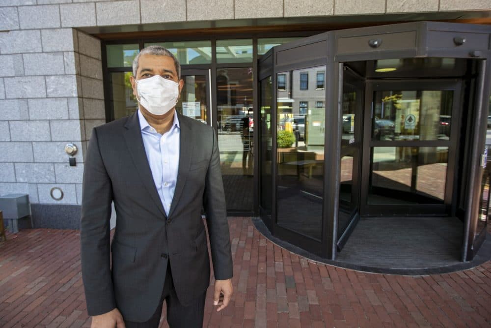 East Boston Neighborhood Health Center president and CEO Manny Lopes says many of the changes patients will see begin before they arrive with online screening, registration and notification to staff when patients walk into the building. (Jesse Costa/WBUR)