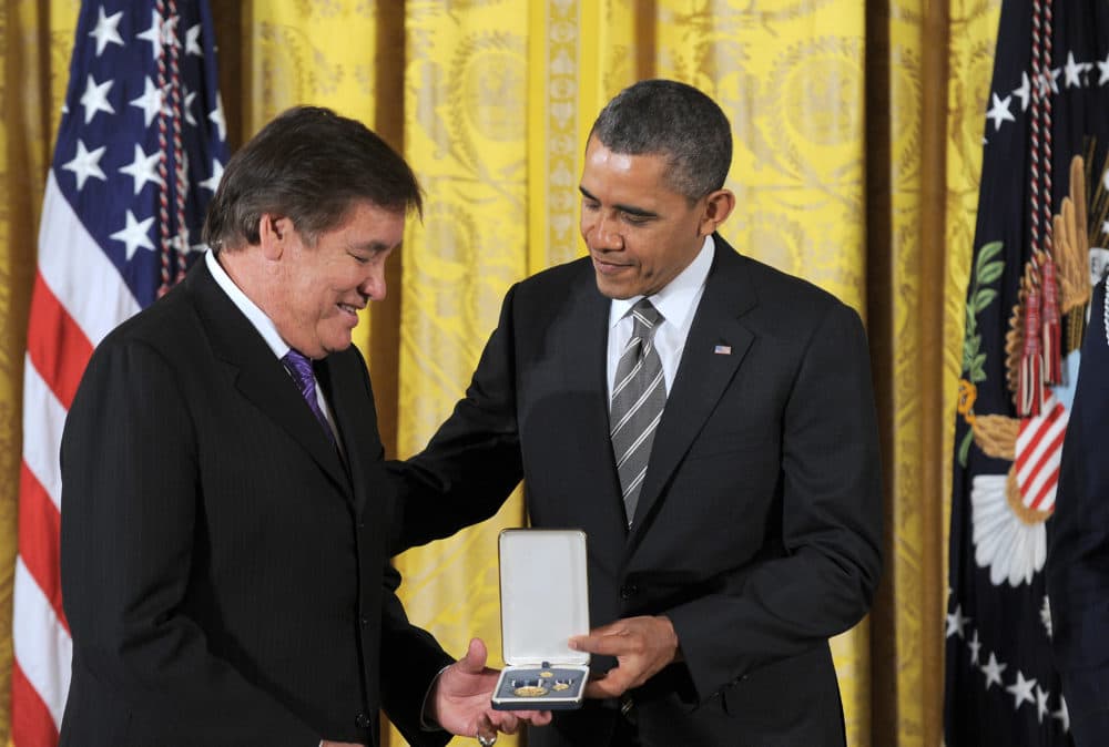 US President Barack Obama presents Running Strong for American Indian Youth founder and Olympian Billy Mills with a 2012 Citizens Medal on Feb. 15, 2013 (Jewel Samad/AFP via Getty Images)