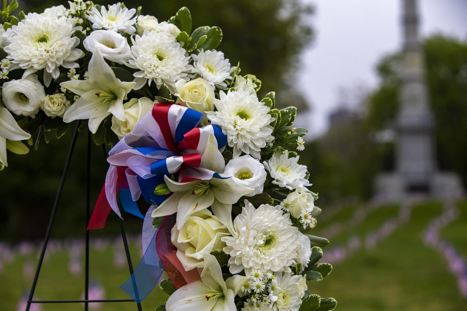 A wreath is placed during the early morning Memorial Day ceremony in the Boston Common. (Jesse Costa/WBUR)