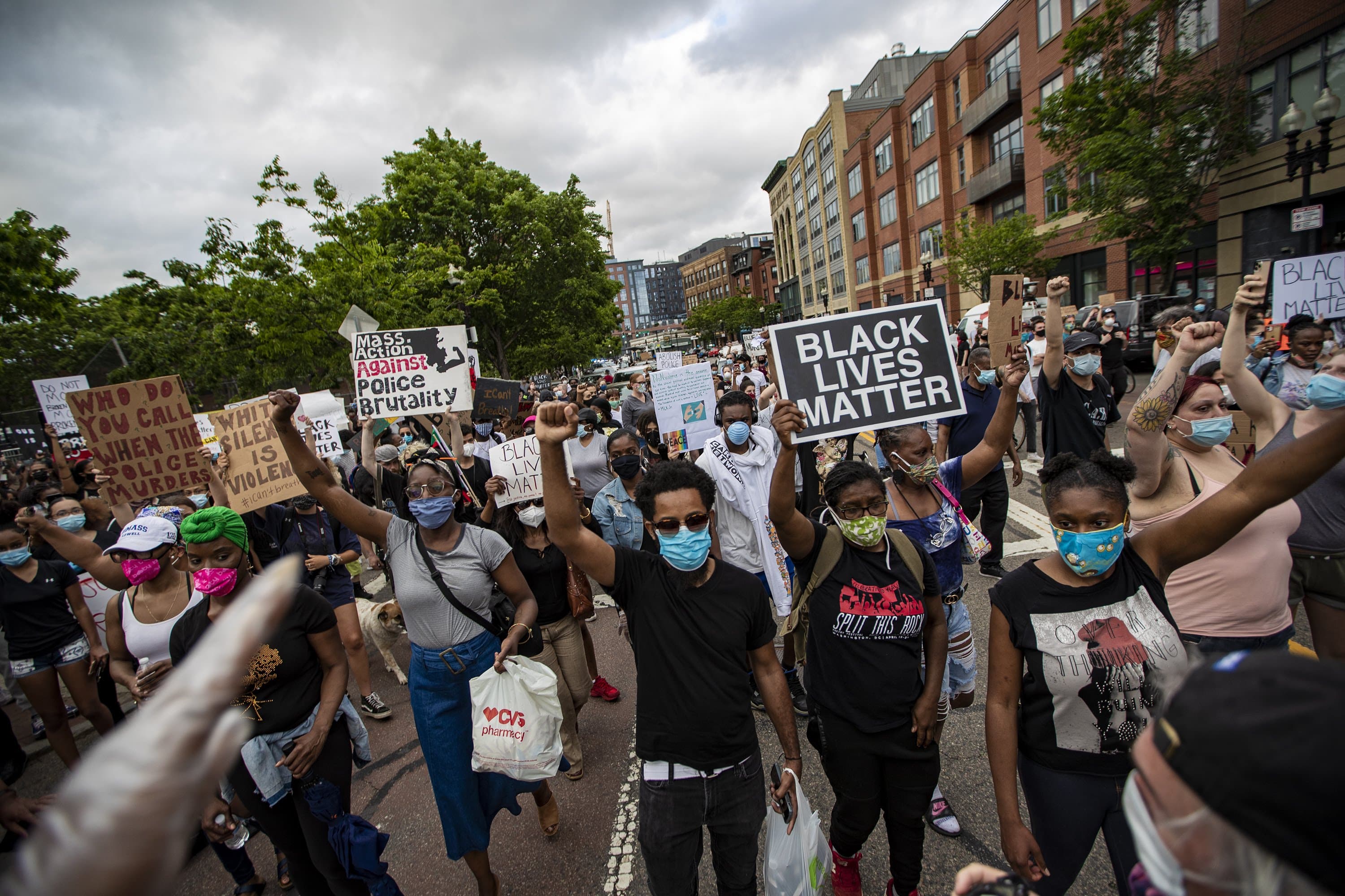Protesters begin their march down Washington Street from Peters Park in the South End. (Jesse Costa/WBUR)