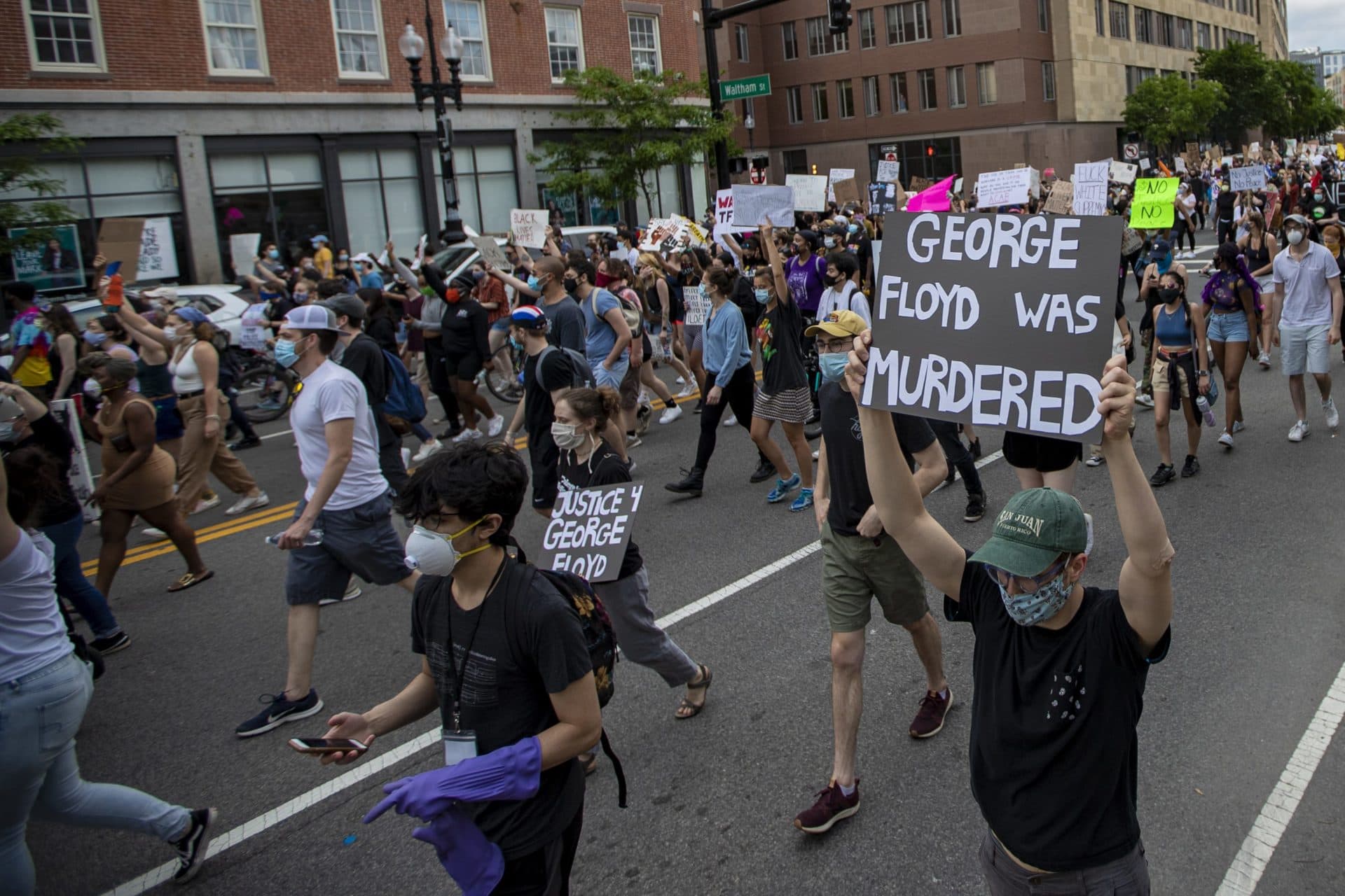 Protesters march from Peters Park in Boston down Washington Street toward Nubian Square. (Jesse Costa/WBUR)