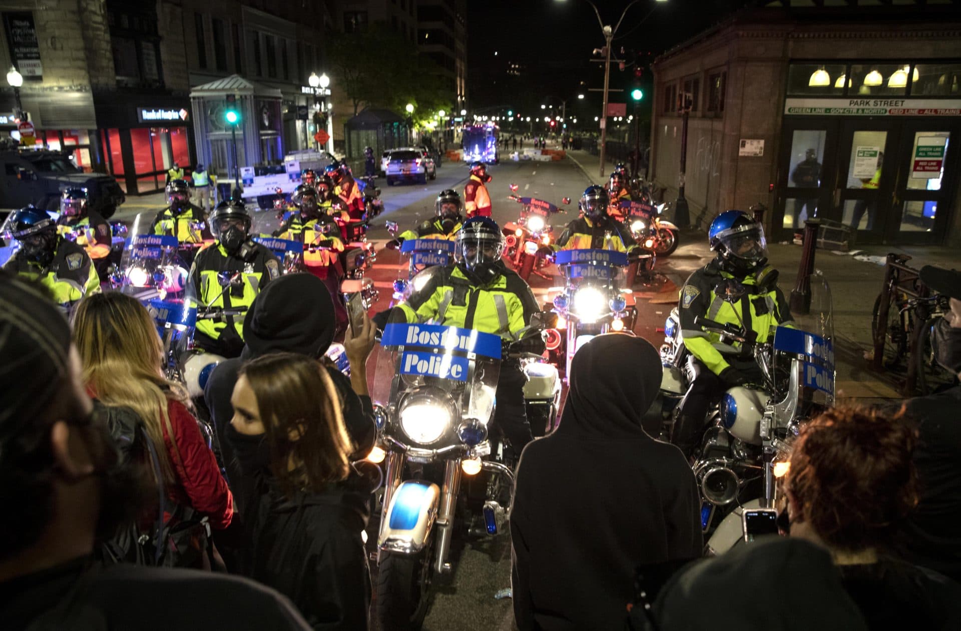 Police motorcycles block protestors way on Tremont Street. (Robin Lubbock/WBUR)