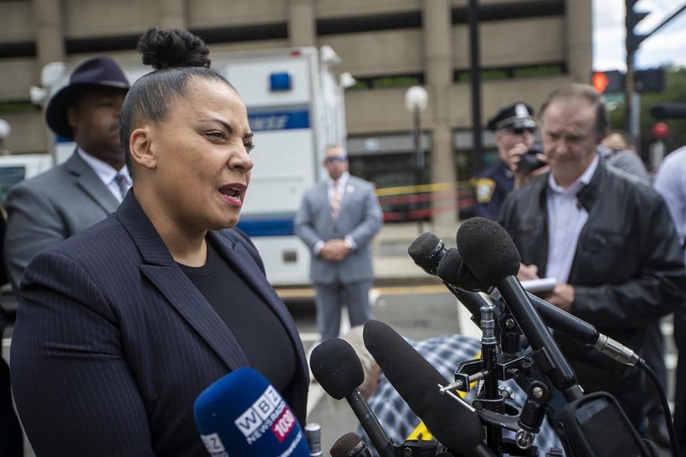 Suffolk County District Attorney Rachael Rollins speaks to the media following a shooting in front of the Colonnade Hotel on Huntington Ave. (Jesse Costa/WBUR)