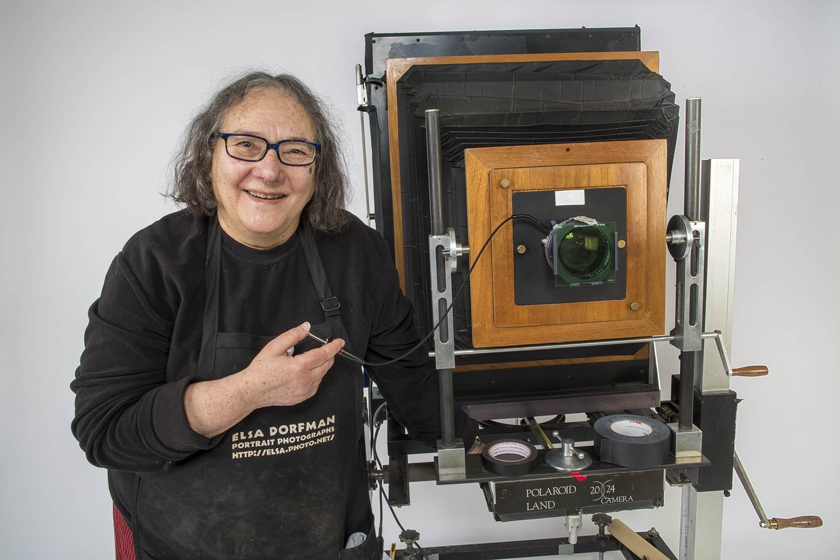 Photographer Elsa Dorfman with her 20x24 Polaroid camera in her studio in 2015. (Jesse Costa/WBUR)