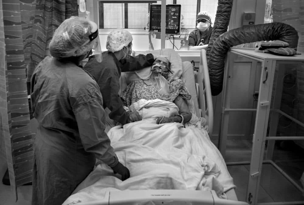 Julie Falasca helps a patient in at Holy Name Medical Center during the first weeks of the COVID-19 pandemic. (Jeff Rhode/Holy Name Medical Center)