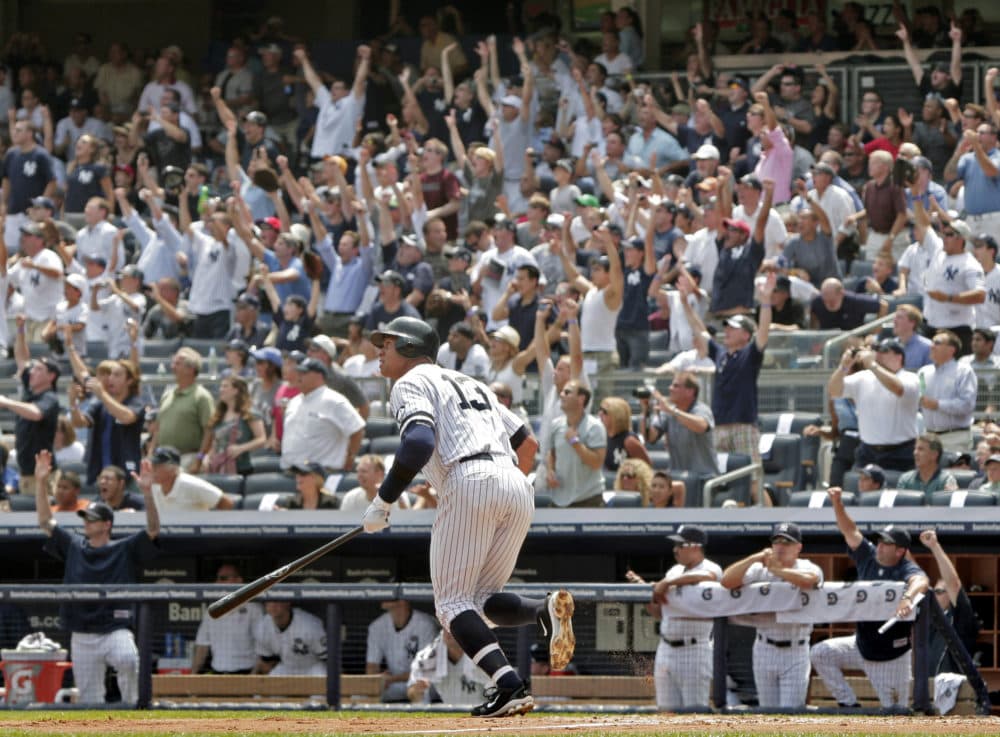 New York Yankees' Alex Rodriguez looks on as fans cheer in the background after hitting his 600th career home run during the first inning of a baseball game against the Toronto Blue Jays at Yankee Stadium on Wednesday, Aug. 4, 2010 in New York. (Kathy Willens/AP)