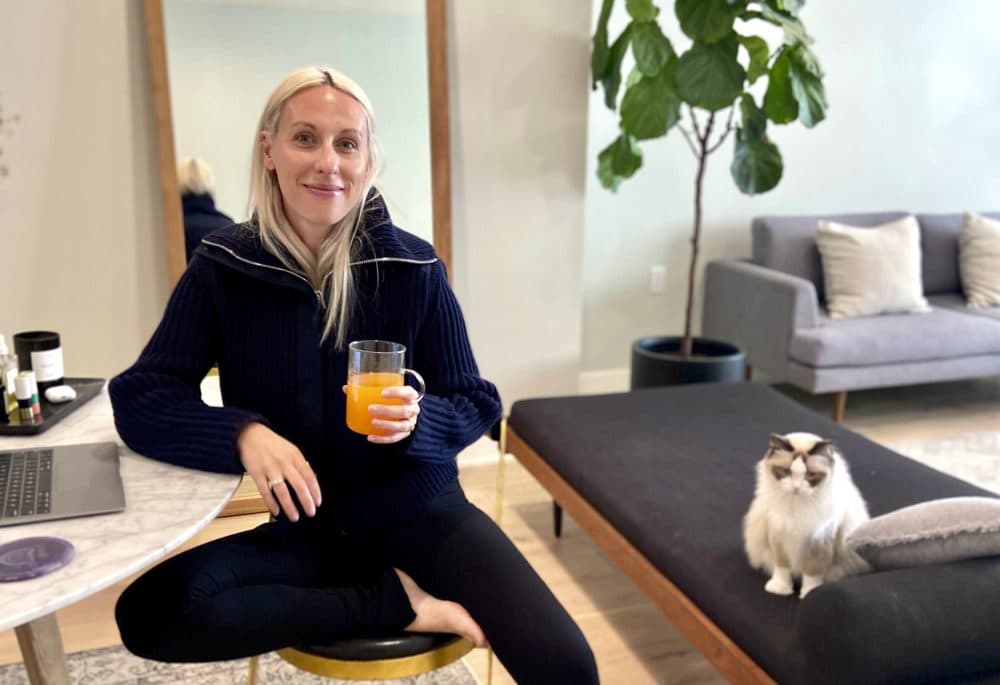 In this April 5, 2020 photo, Goop fashion director Ali Pew is poses in Los Angeles. During the pandemic, a pronounced fashion trend is emerging in loungewear. It's comfy, everyday clothing with a bit more refinement; pulled together enough for a zoom conference call with your boss. (Oliver Clark/AP)